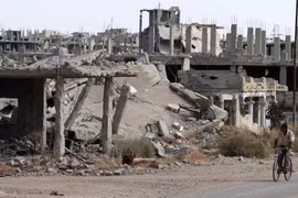 Cảnh đổ nát sau các cuộc giao tranh ở thành phố Daraa, Syria tháng 7/2019. (Ảnh: AFP/TTXVN)