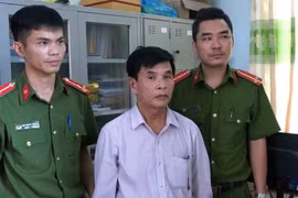 Đối tượng Dương Minh Hiến bị bắt giữ. (Ảnh: Võ Dung/TTXVN)