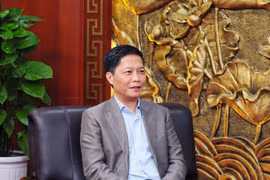 Bộ trưởng Bộ Công Thương Trần Tuấn Anh đang trao đổi với báo chí. (Ảnh: Vietnam+)