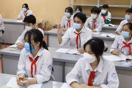 Học sinh lớp 9 của Hà Nội đi học trực tiếp. (Ảnh: Thanh Tùng/TTXVN) 