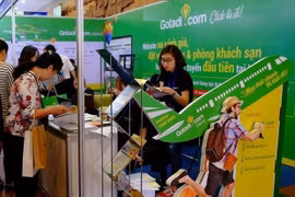Gian hàng của một trang du lịch trực tuyến tại Hội chợ Du lịch quốc tế lần thứ 6 - VITM Hà Nội 2018. (Ảnh: Mai Mai/Vietnam+)