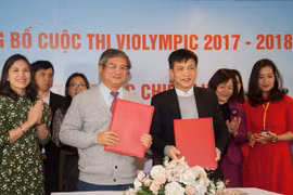 Đại diện FPT và Viện Khoa học Giáo dục Việt Nam ký kết thỏa thuận hợp tác. (Ảnh: FPT)