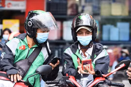 Tính năng mới giúp các đối tác tài xế an tâm hơn khi làm việc. (Ảnh: N.P/Vietnam+)