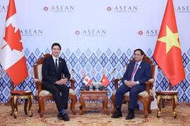 Thủ tướng Phạm Minh Chính tiếp Thủ tướng Canada Justin Trudeau. (Ảnh: Dương Giang/TTXVN) 