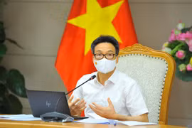 Phó Thủ tướng Vũ Đức Đam chủ trì cuộc họp. (Ảnh: Minh Đức/TTXVN) 