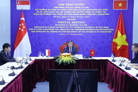 Đại tướng Tô Lâm, Ủy viên Bộ Chính trị, Bộ trưởng Bộ Công an, tham dự cuộc họp trực tuyến tại điểm cầu Hà Nội. (Ảnh: Phạm Kiên/TTXVN) 