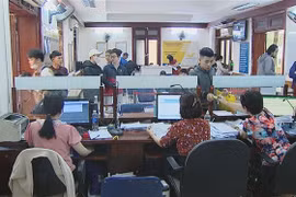 Hà Nội khắc phục tình trạng quá tải cấp phiếu lý lịch tư pháp. (Ảnh: Kim Anh/TTXVN)
