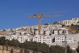 Công trình xây dựng một khu định cư của Israel ở Bờ Tây. (Ảnh: AFP/TTXVN)
