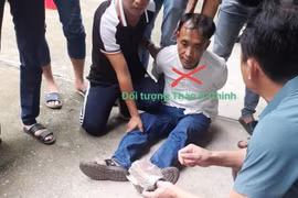 Đối tượng Thào A Chinh bị bắt giữ. (Ảnh: TTXVN phát) 