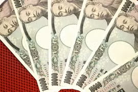 Đồng 10.000 yen tại ngân hàng ở Tokyo, Nhật Bản. (Ảnh: AFP/TTXVN)