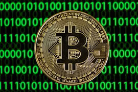 Đồng tiền kỹ thuật số Bitcoin. (Ảnh: AFP/TTXVN) 