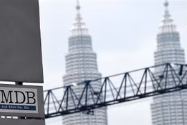 Biển quảng cáo Quỹ đầu tư nhà nước Malaysia (1MDB) bên ngoài một tòa nhà ở Kuala Lumpur, Malaysia, ngày 8/7/2015. (Nguồn: AFP/TTXVN) 
