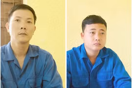 Đối tượng Nguyễn Mậu Văn (trái) và Huỳnh Chí Linh bị bắt tạm giam. (Ảnh: TTXVN phát)