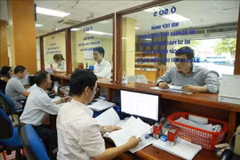 Hoạt động tại Cục Thuế Hà Nội. (Ảnh: TTXVN phát) 