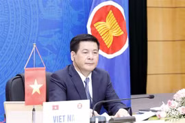 Bộ trưởng Công Thương Nguyễn Hồng Diên tham dự hội nghị và phát biểu tại điểm cầu Hà Nội. (Ảnh: Trần Việt/TTXVN) 