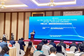 Ông Hoàng Minh Chiến, Phó Cục trưởng Cục Xúc tiến thương mại phát biểu tại Hội nghị Xúc tiến Thương mại, Đầu tư và Kết nối giao thương Việt Nam-Trung Quốc (Sơn Đông). (Ảnh: Xuân Quảng/Vietnam+) 