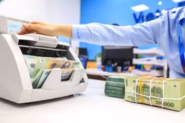 Ngân hàng Nhà nước khẳng định Thông tư 06 tháo gỡ rất nhiều nội dung nhằm tạo điều kiện thuận lợi cho khách hàng. (Ảnh: PV/Vietnam+)
