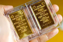 Giá vàng SJC nhảy nhót chóng mặt. (Ảnh: Vietnam+)