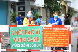 Người dân huyện Xuân Lộc quyết tâm khóa chặt và giữ vững "vùng xanh." (Ảnh: TTXVN phát)