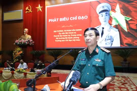 Đại tướng Phan Văn Giang, Ủy viên Bộ Chính trị, Bộ trưởng Bộ Quốc phòng đọc tham luận. (Ảnh: Trọng Đức/TTXVN)