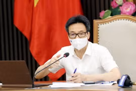 Phó Thủ tướng Vũ Đức Đam chủ trì cuộc họp giao ban trực tuyến với lãnh đạo TP Hồ Chí Minh về công tác phòng, chống dịch. (Ảnh: Phạm Kiên/TTXVN)
