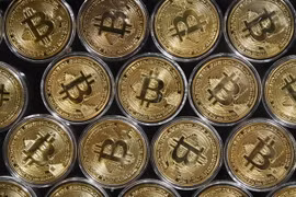 Đồng tiền kỹ thuật số bitcoin. (Ảnh: AFP/TTXVN)