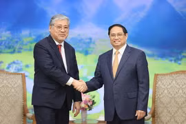 Thủ tướng Phạm Minh Chính tiếp Bộ trưởng Ngoại giao Philippines Enrique Manalo. (Ảnh: Dương Giang/TTXVN)