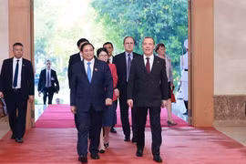 Thủ tướng Phạm Minh Chính tiếp Chủ tịch Đảng Nước Nga Thống nhất Dmitry Medvedev. (Ảnh: Dương Giang/TTXVN)