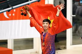 Vận động viên Nguyễn Huy Hoàng giành Huy chương Vàng nội dung 200m bơi bướm nam với thành tích 1 phút 58 giây 81. (Ảnh: TTXVN)