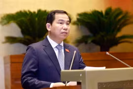 Chủ nhiệm Ủy ban Tài chính, Ngân sách của Quốc hội Lê Quang Mạnh trình bày Báo cáo thẩm tra dự án Luật Đầu tư công (sửa đổi). (Ảnh: Doãn Tấn/TTXVN)