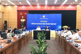 Hội nghị: “Triển khai Kế hoạch thực hiện Hiệp định Đối tác Kinh tế Toàn diện Khu vực-RCEP,” do Bộ Công Thương tổ chức ngày 13/7. (Ảnh: Đức Duy/Vietnam+)