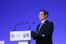 Thủ tướng Phạm Minh Chính phát biểu tại Hội nghị Thượng đỉnh Khí hậu trong khuôn khổ Hội nghị lần thứ 26 các Bên tham gia Công ước khung của Liên hợp quốc về Biến đổi khí hậu (COP26) năm 2021. (Ảnh: Dương Giang/TTXVN)