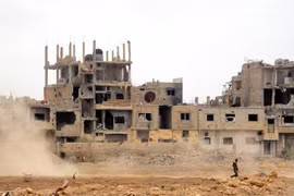 Cảnh đổ nát sau các cuộc xung đột ở Damascus, Syria ngày 22/5. (Nguồn: THX/TTXVN)