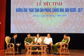 Các đại biểu đối thoại về công tác phòng, chống mua bán người. (Ảnh: Nguyễn Chiến/TTXVN)