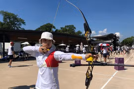 Vận động viên Ánh Nguyệt đại diện cho Việt Nam ở môn bắn cung tại Olympic Tokyo 2020. (Ảnh: Đoàn thể thao Việt Nam) 