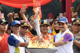 Ngọn đuốc Đại hội thể thao châu Á (ASIAD) tại Jakarta (Indonesia), ngày 15/8/2018. (Nguồn: THX/TTXVN)