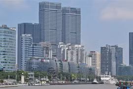 Kinh tế Trung Quốc phải đối mặt với nhiều sóng gió trong năm 2022, trong đó có sự suy yếu của thị trường bất động sản. (Ảnh: AFP/TTXVN)