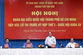 Chủ tịch nước Nguyễn Xuân Phúc phát biểu tại buổi tiếp xúc cử tri tại thành phố Thủ Đức (Thành phố Hồ Chí Minh), chiều 11/5. (Ảnh: Thống Nhất/TTXVN)