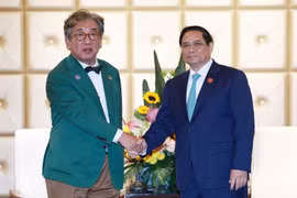 Thủ tướng Phạm Minh Chính tiếp Chủ tịch Ủy ban về Trung hoà Carbon và Tăng trưởng xanh Hàn Quốc Kim Sang-hyup. (Ảnh: Dương Giang/TTXVN)
