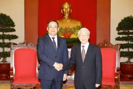 Tổng Bí thư Nguyễn Phú Trọng tiếp Phó Thủ tướng Lào Sonexay Siphandone đang thăm và làm việc tại Việt Nam. (Ảnh: Trí Dũng/TTXVN)