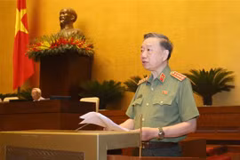 Bộ trưởng Bộ Công an Tô Lâm trình bày Tờ trình về dự án Luật Cư trú (sửa đổi). (Ảnh: Doãn Tấn/TTXVN)