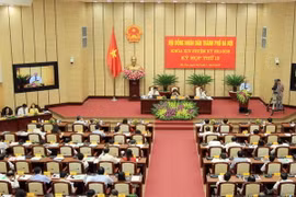 Quang cảnh phiên khai mạc kỳ họp thứ 13 Hội đồng Nhân dân thành phố Hà Nội khóa XIV. (Ảnh: An Đăng/TTXVN)