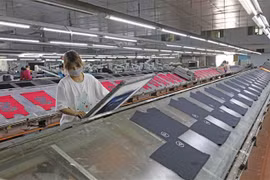 Bức tranh kinh tế 6 tháng có nhiều điểm sáng, đáng tự hào. (Ảnh: Trần Việt/TTXVN)