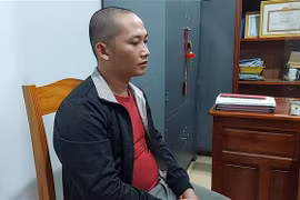 Đối tượng Trần Thanh Tú tại cơ quan điều tra. (Ảnh: TTXVN phát)