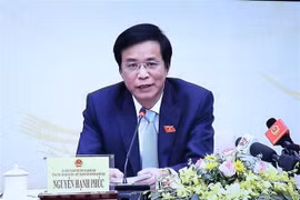 Tổng Thư ký, Chủ nhiệm Văn phòng Quốc hội Nguyễn Hạnh Phúc chủ trì họp báo. (Ảnh: Trọng Đức/TTXVN)