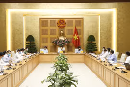 Phó Thủ tướng Chính phủ Vũ Đức Đam, Trưởng ban Chỉ đạo Quốc gia phòng, chống dịch COVID-19 chủ trì cuộc họp. (Ảnh: Doãn Tấn/TTXVN)