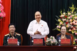 Thủ tướng Nguyễn Xuân Phúc phát biểu tại buổi tiếp xúc cử tri huyện An Lão. (Ảnh: Thống Nhất/TTXVN)