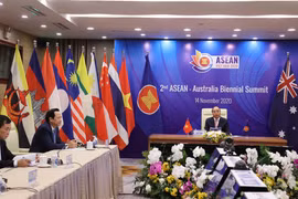 Thủ tướng Nguyễn Xuân Phúc, Chủ tịch ASEAN 2020 đồng chủ trì hội nghị tại điểm cầu Hà Nội. (Ảnh: Thống Nhất/TTXVN)