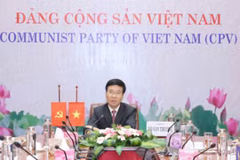 Trưởng Ban Tuyên giáo Trung ương Võ Văn Thưởng tại hội đàm trực tuyến. (Ảnh: Phương Hoa/TTXVN)