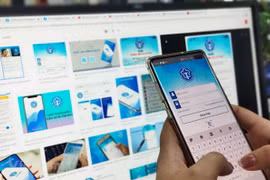 Truy cập ứng dụng VssID-Bảo hiểm xã hội số. (Ảnh: PV/Vietnam+)